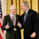 Former president George W. Bush presents a National Medal of Science in 2006 to Norman Borlaug for his work in creating disease resistant and high-yield wheat, providing a new quality food source for millions of people around the world. Image: White House photo by Eric Draper